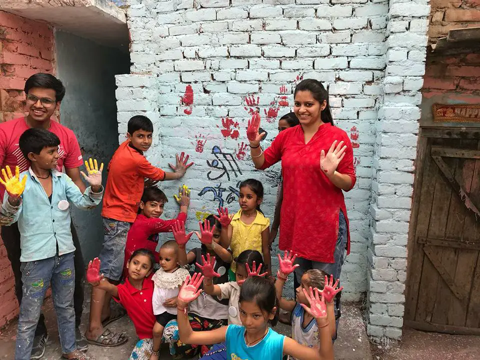 LECIN Painting walls for a change project 