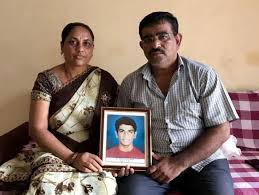 Dadarao Bilhore along his wife and son photo